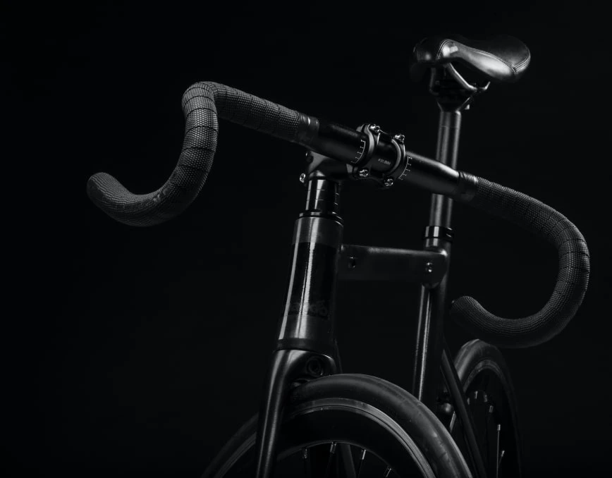 Black and white photo of a bike handlebar