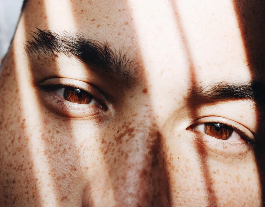 Close-up portrait with freckles